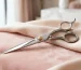 Best hairdressing scissors for barbers in the UK featured image showing professional salon scissors in a premium editorial setting