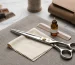 How often should hairdressing scissors be sharpened featured image showing professional scissors with a premium maintenance-focused look